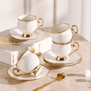 Set de 4 tazas, platos y cucharas